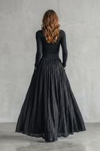 Neravelle Turtleneck Top and Pleated Maxi Skirt Two Piece Set in Black