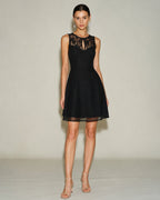 Sienna Boat Neck Sleeveless Lace Mini Dress in Black in Black